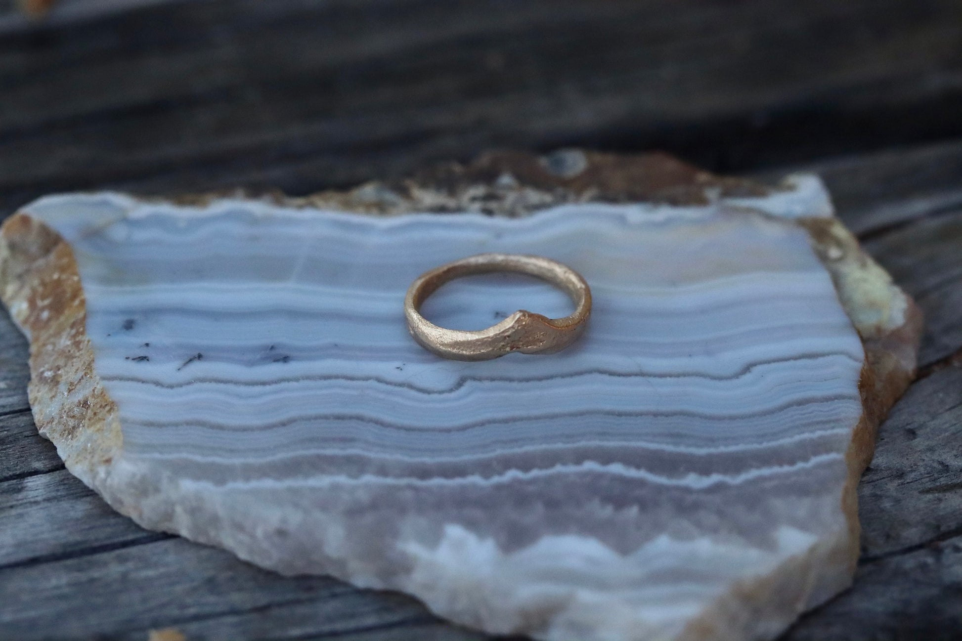 sandcast organic rustic 14kt recycled gold V apex mountain wedding band